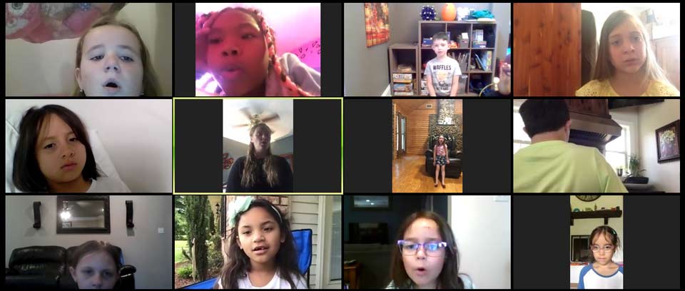 Kids in Metairie singing online during Voice class!